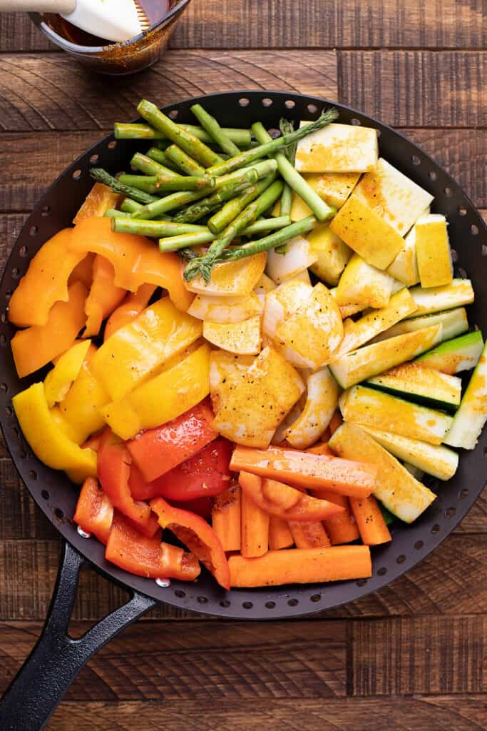 vegetables in grill basket on table