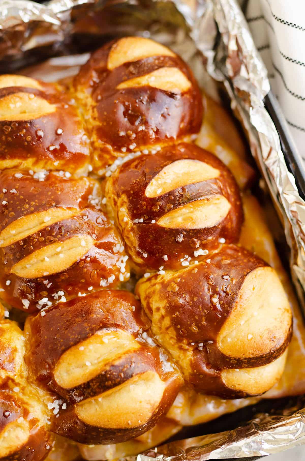 assembled pretzel sliders in pan