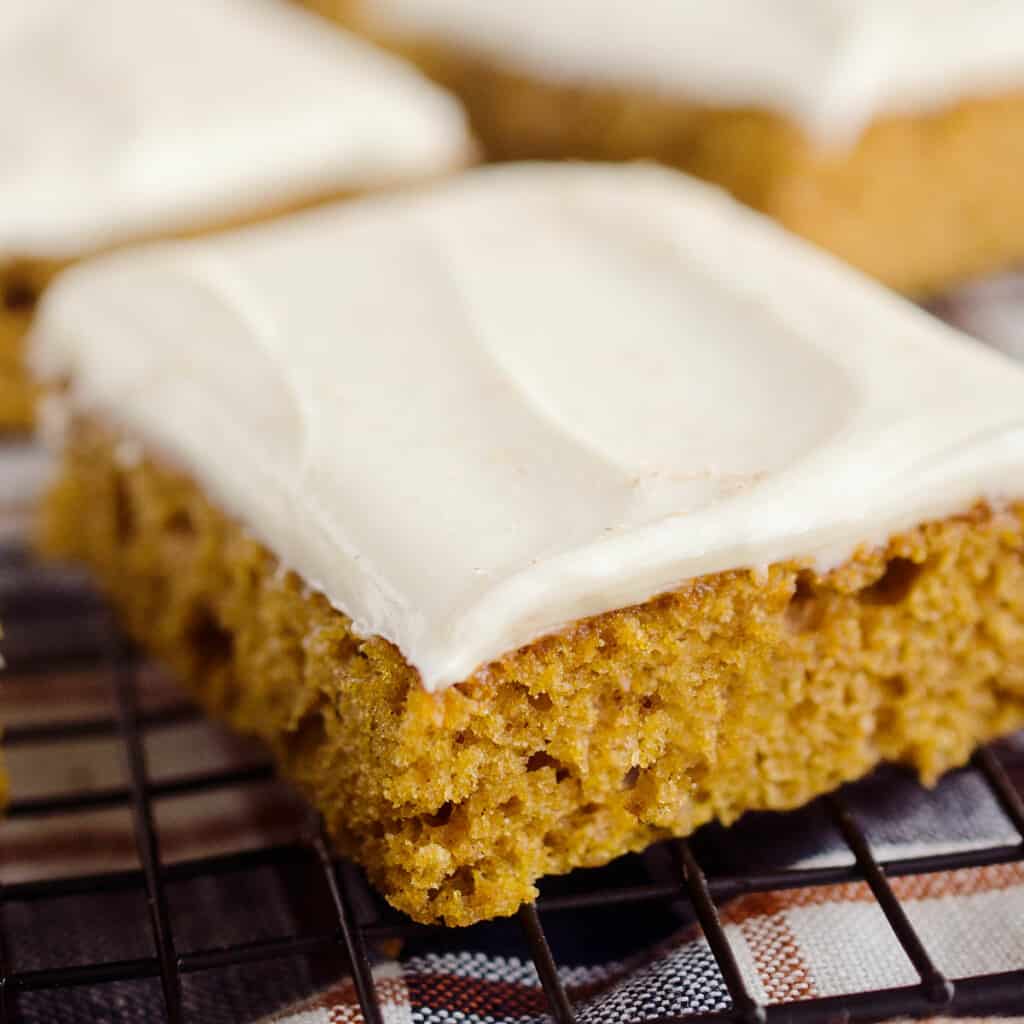 slice of pumpkin cake on cooling rack