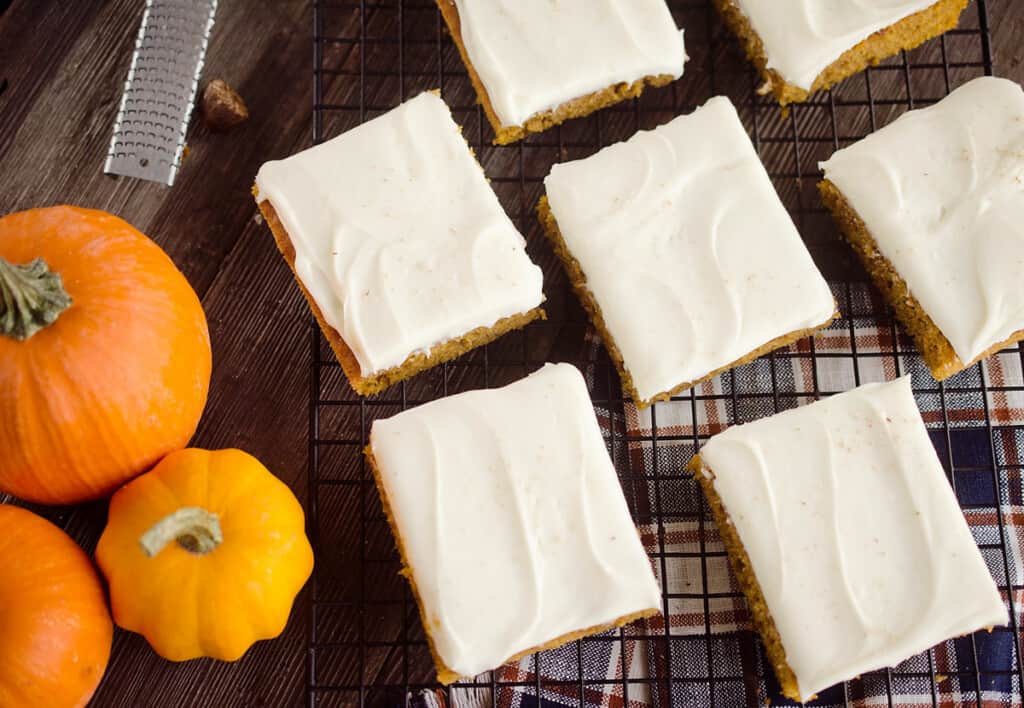 pumpkin bars sliced on cooling rack