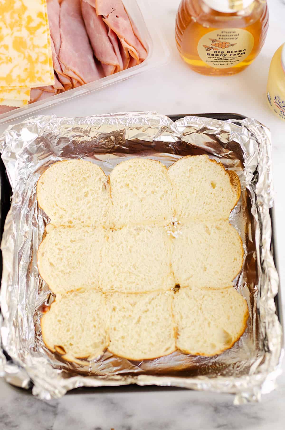 bottom half of sliders in tinfoil lined pan