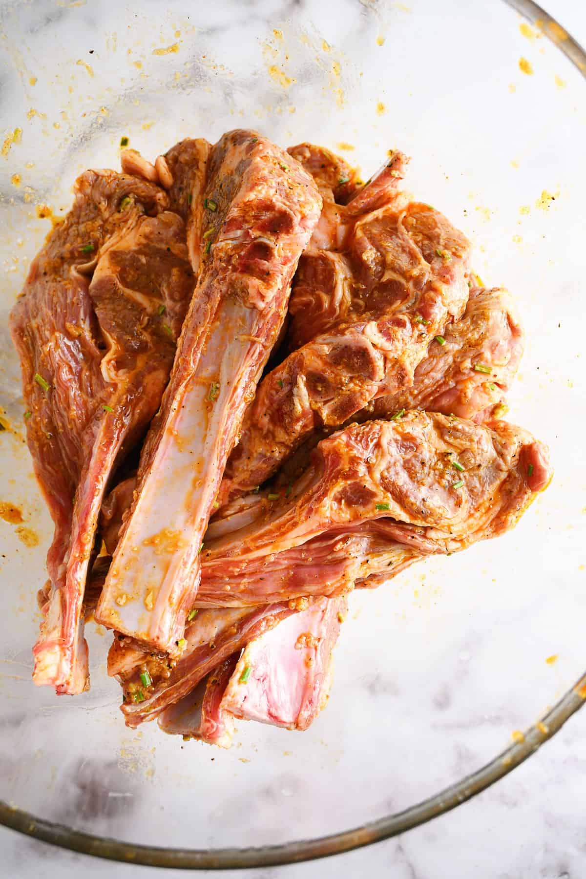 marinated lamb chops in bowl