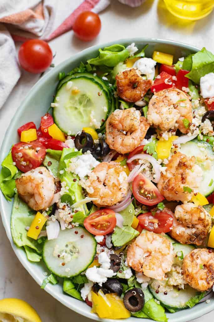 Large bowl of Greek Shrimp Quinoa Salad with veggies