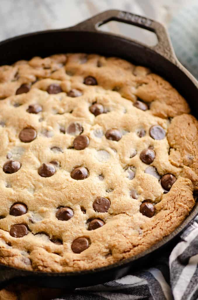 cast iron pan with chocolate chip cookie