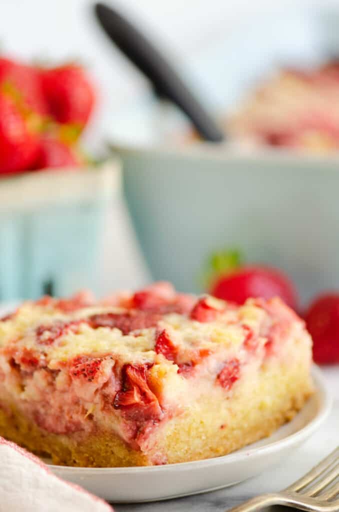 strawberry custard dessert on plate with fork