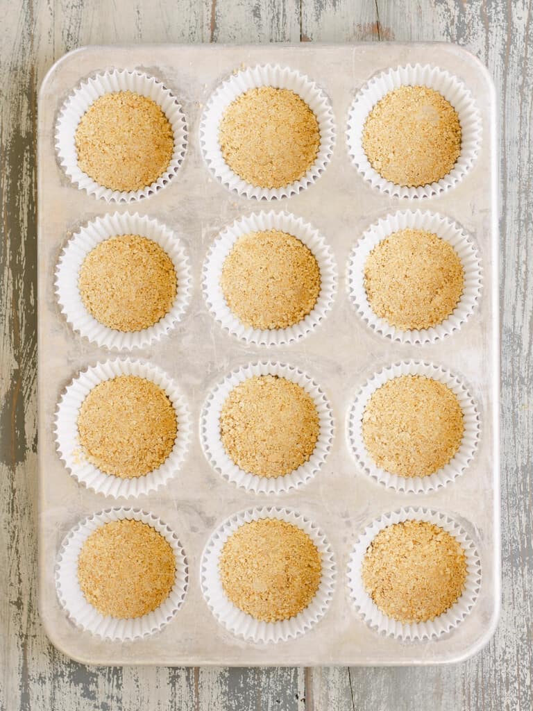 graham cracker crust pressed in mini muffin tins