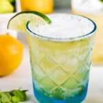 fizzy lemon lime punch in etched blue glass