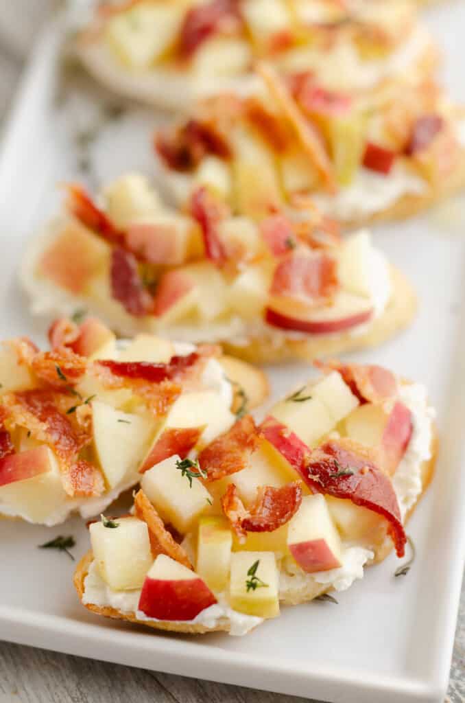 apple bacon bleu cheese crostini served on platter