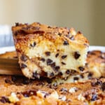 slice of chocolate chip coffee cake over pan