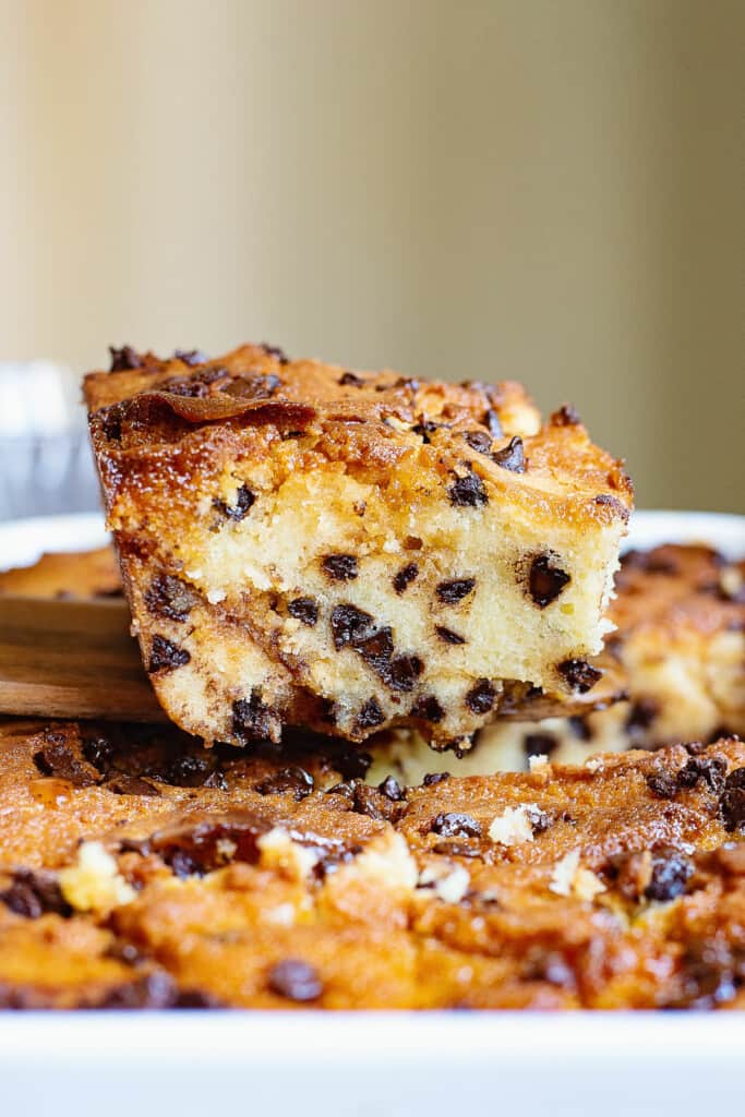 slice of chocolate chip coffee cake over pan