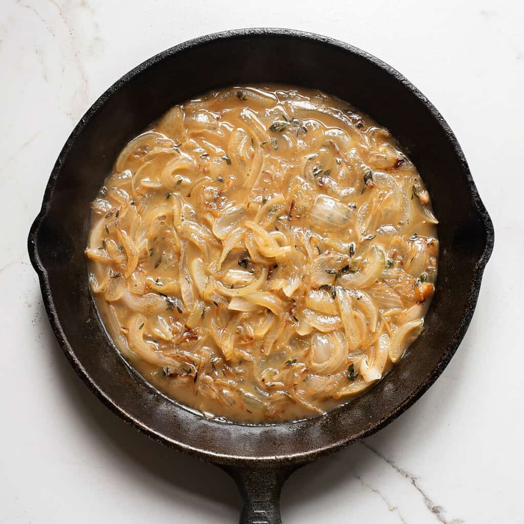 french onions in cast iron skillet