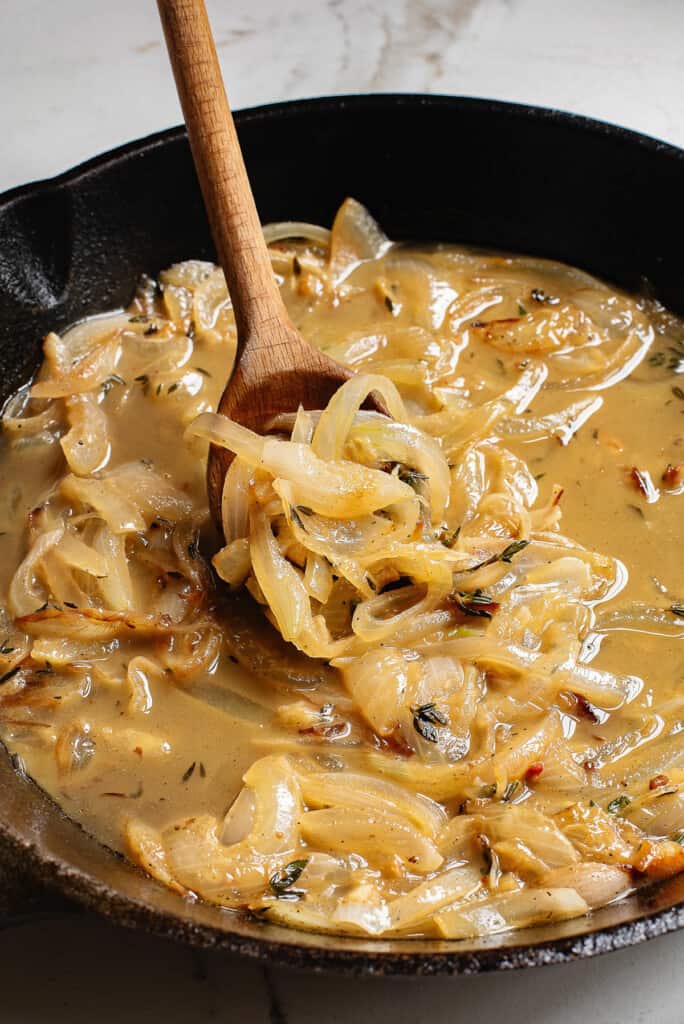 French onions in cast iron skillet