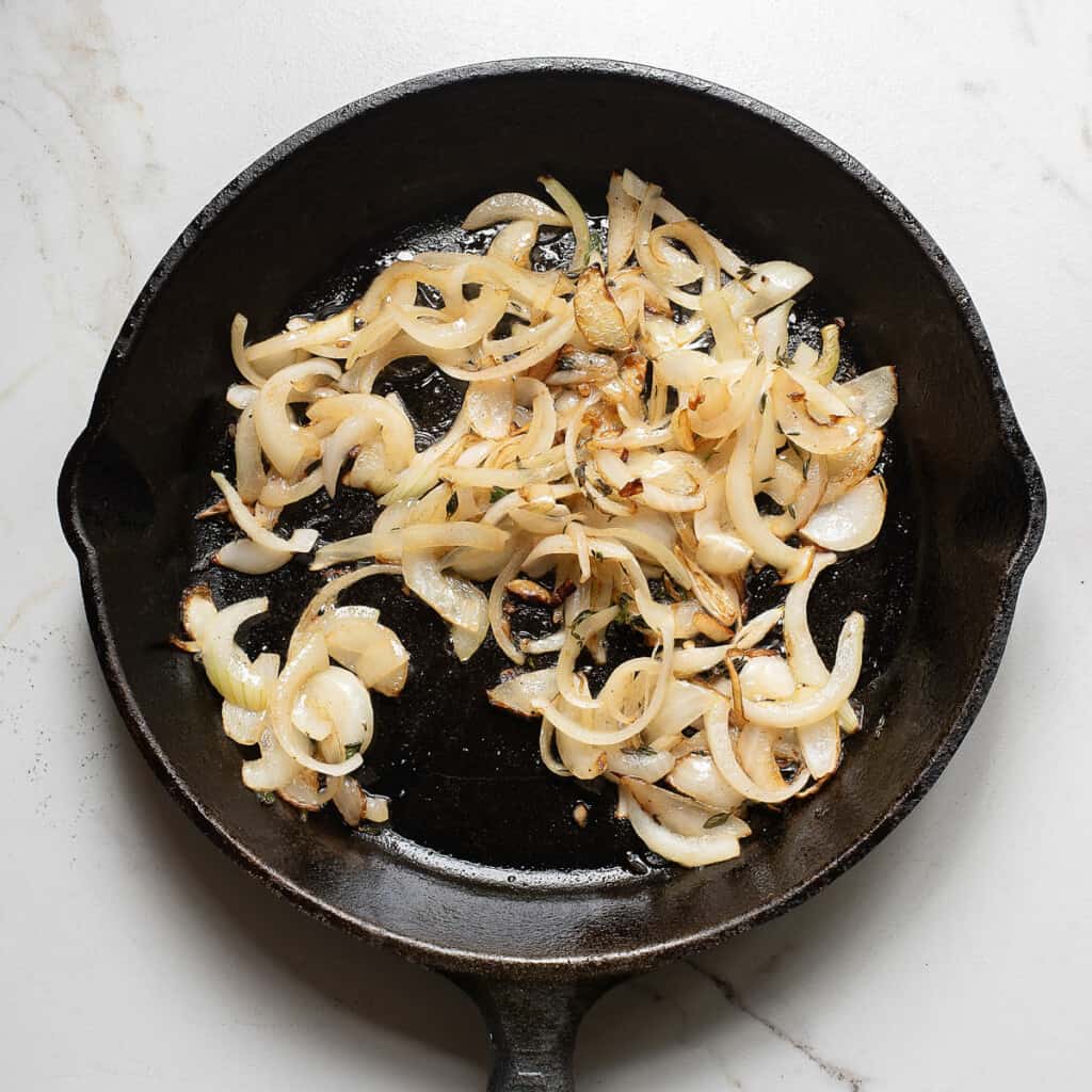 sautéed onions in cast iron skillet