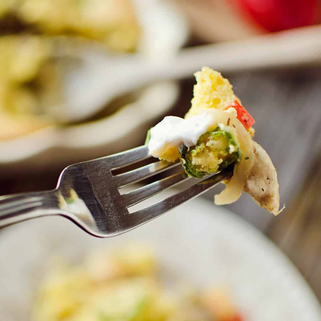 bite of of jalapeno cornbread chicken casserole on fork