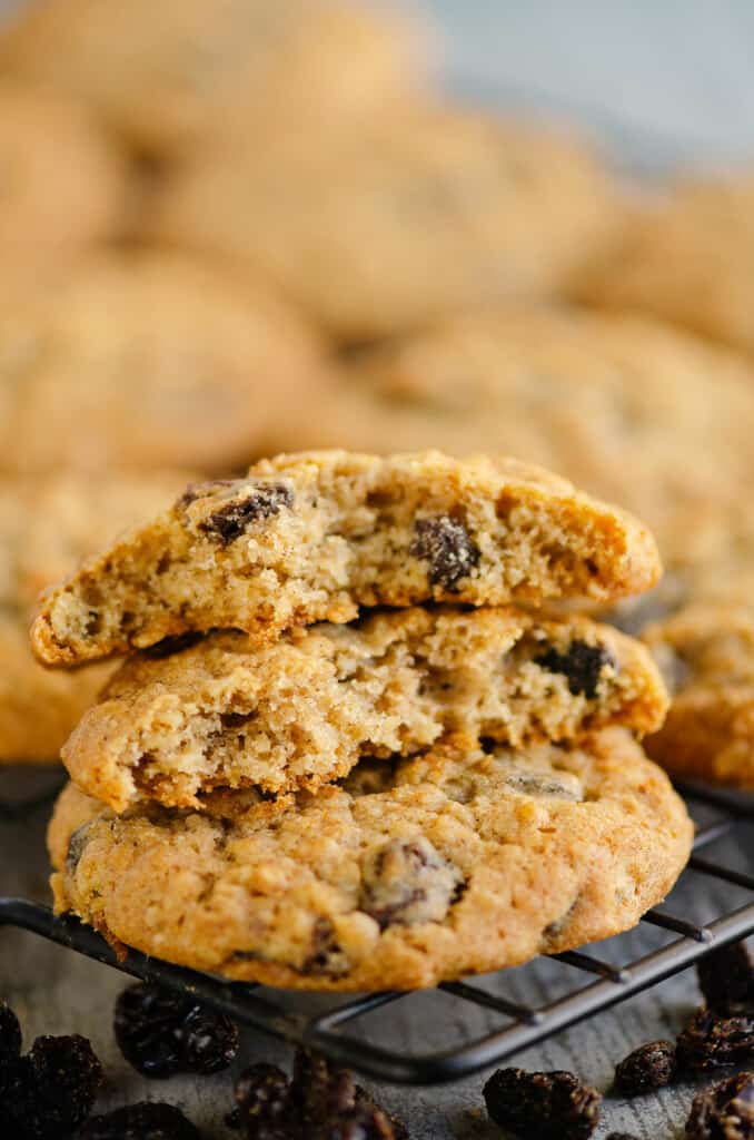 oatmeal raisin cookies broken on half on cooling rack