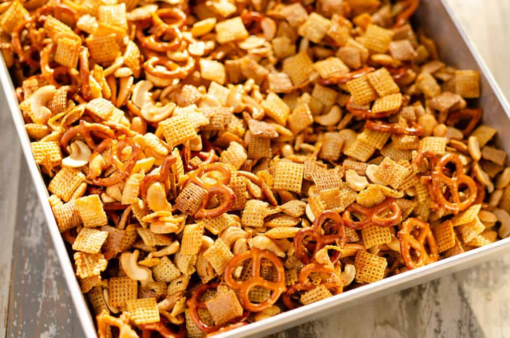 roasting pan with baked hot honey chex mix