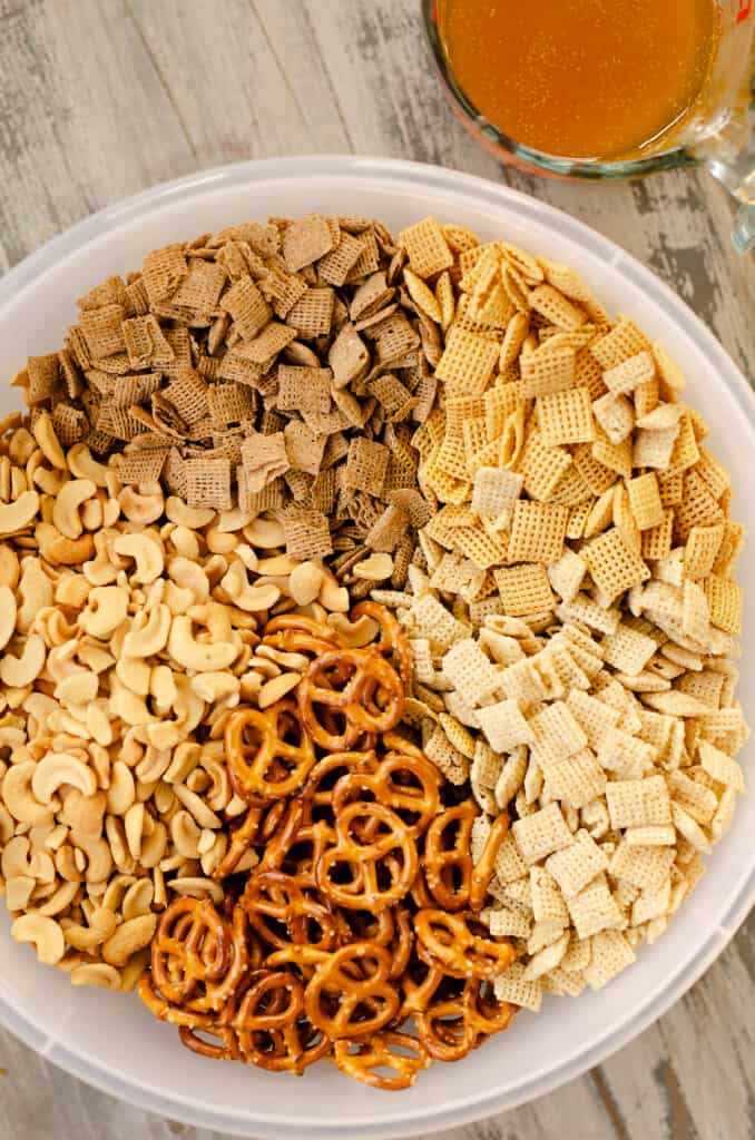 large bowl with Chex cereal, pretzels and cashews