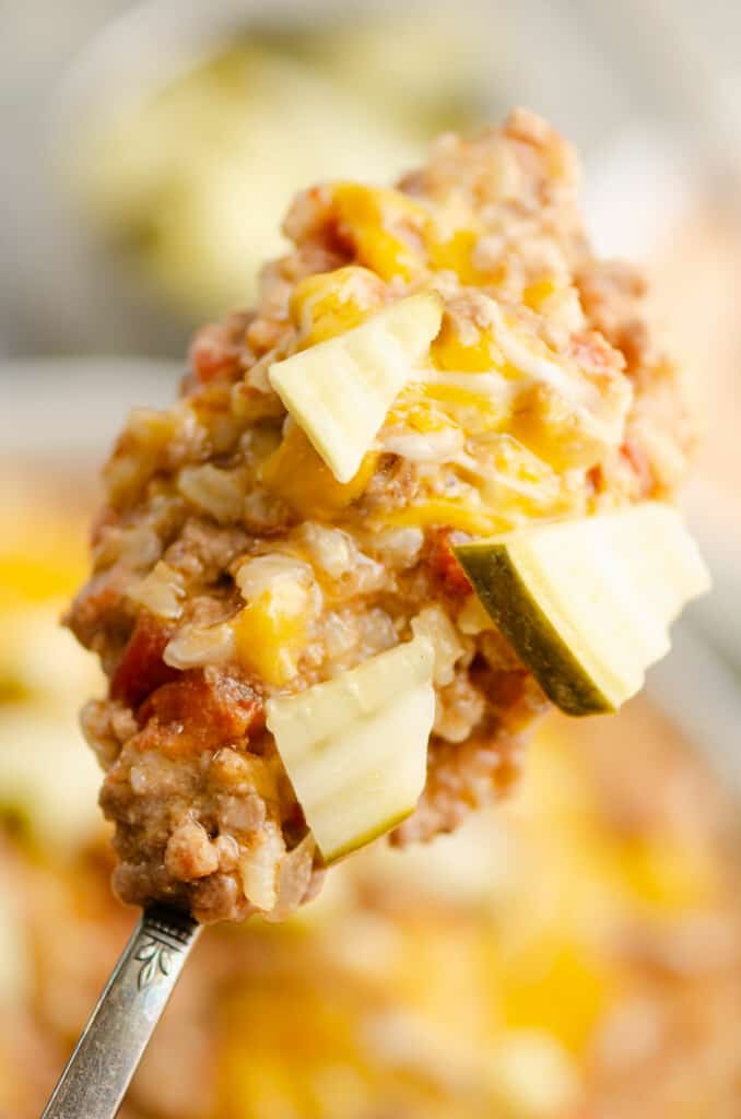 Cheeseburger rice casserole on spoon