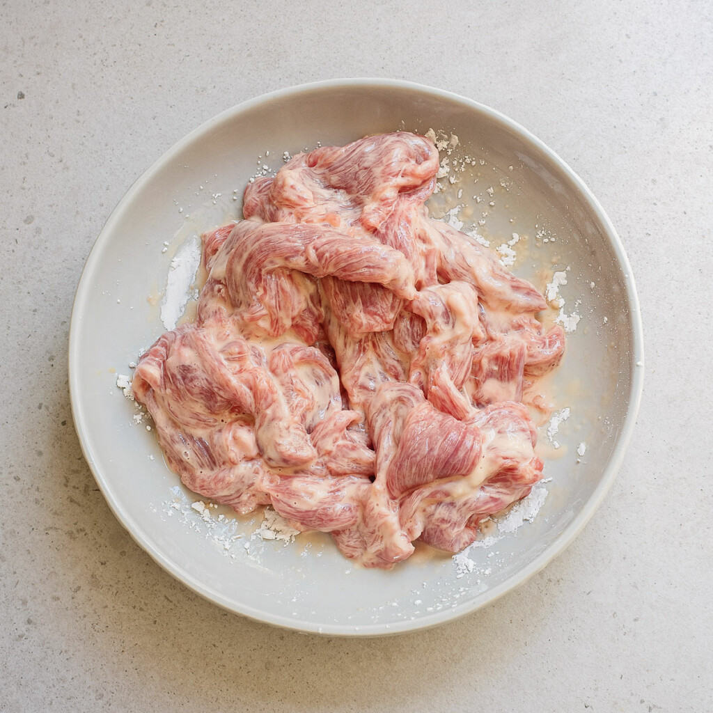 beef strips in cornstarch and egg mixture