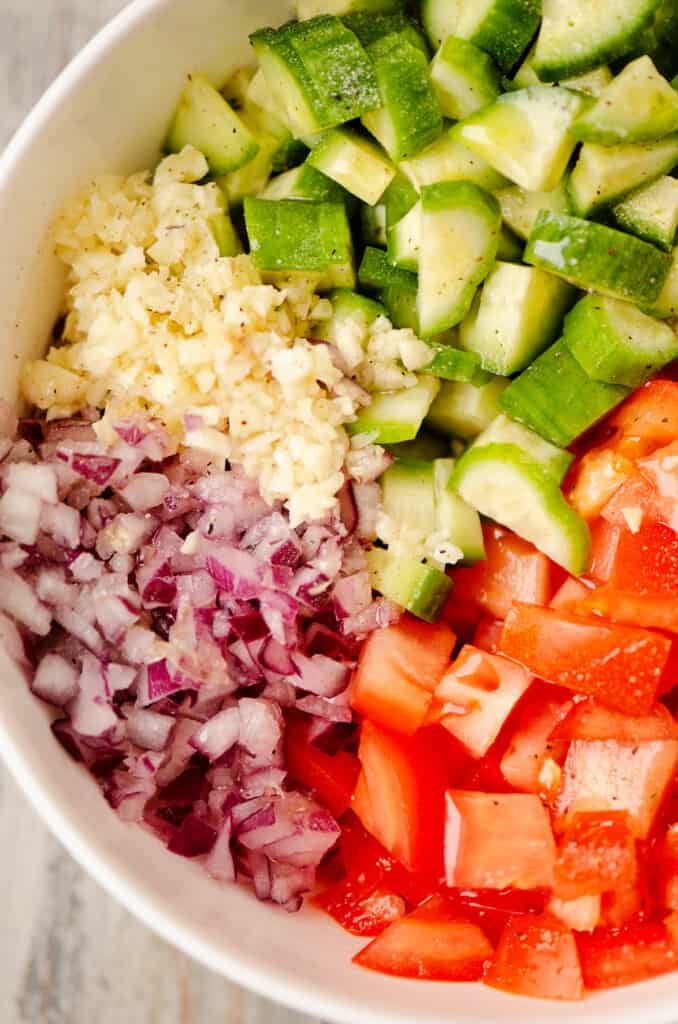 cucumber tomato salad in bowl