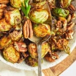 maple dijon and pecan brussels sprouts on serving spoon